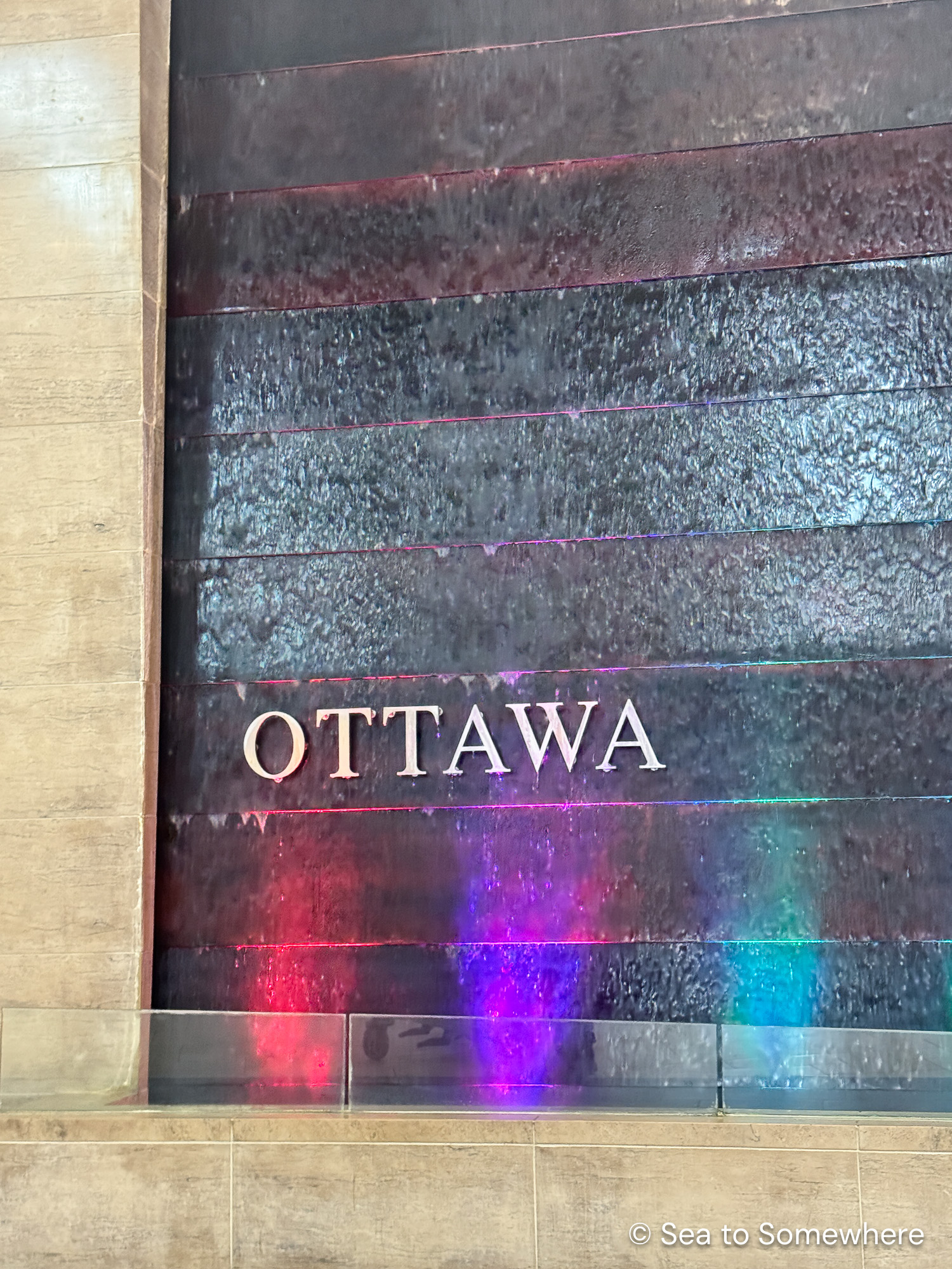 a colourful wall with the word Ottawa on it
